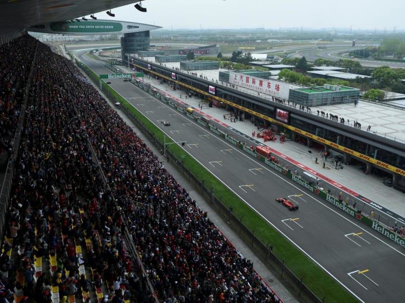 This general view shows spectators watching the Formula One Chinese Grand Prix in Shanghai on April 14, 2019. Two years ago the Shanghai International Circuit hosted a Covid hospital, but this weekend it will stage Formula One once more as the sport returns to China for the first time since the pandemic.