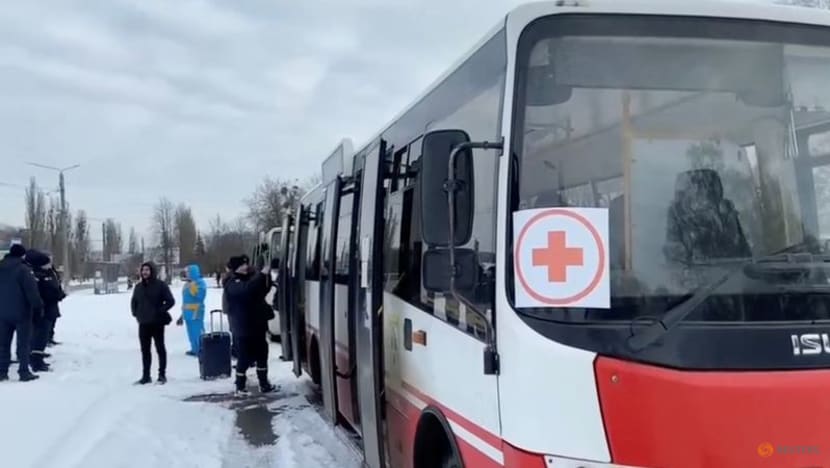 Ukrainians escape besieged Sumy through corridor; refugee total tops 2 million Ukrainians escape besieged Sumy through corridor; refugee total tops 2 million