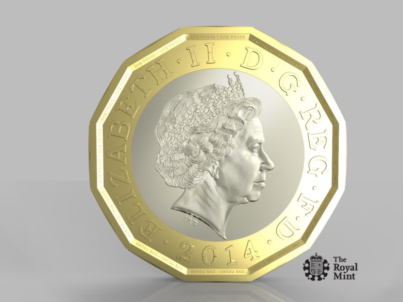 This undated handout photo issued by HM Treasury shows the side of a new one pound coin announced by the Government. Photo: AP