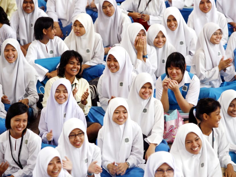 Malay, Indian and Chinese students at a school in Malaysia.