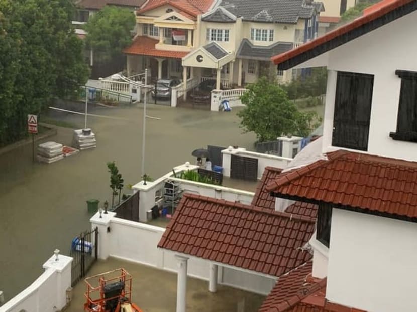 A photo showing flooded roads in a residential estate shared on Facebook by Ms Sim Ann, Member of Parliament for Holland-Bukit Timah Group Representation Constituency.
