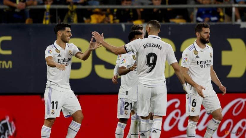 Nacho and Asensio score late to give Real Madrid 2-0 win at Cadiz Nacho and Asensio score late to give Real Madrid 2-0 win at Cadiz