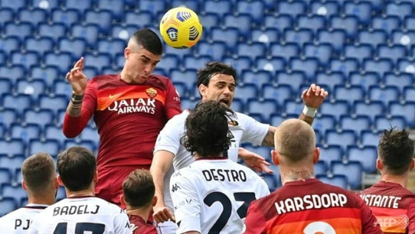 Football: Mancini header earns Roma narrow victory over Genoa Football: Mancini header earns Roma narrow victory over Genoa