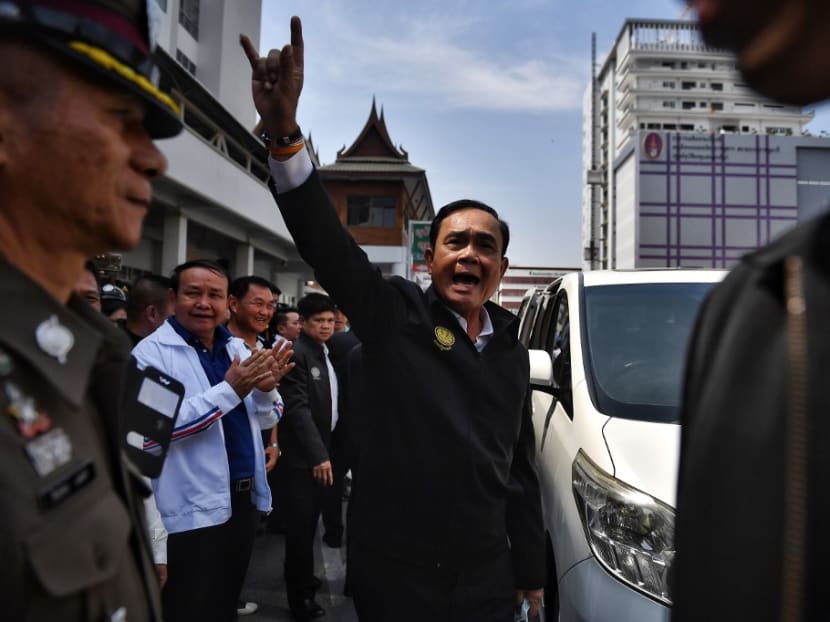 In this file photo taken on Feb 9, 2020, Thailand's prime minister Prayut Chan-ocha gestures to the public in the Thai northeastern city of Nakhon Ratchasima.