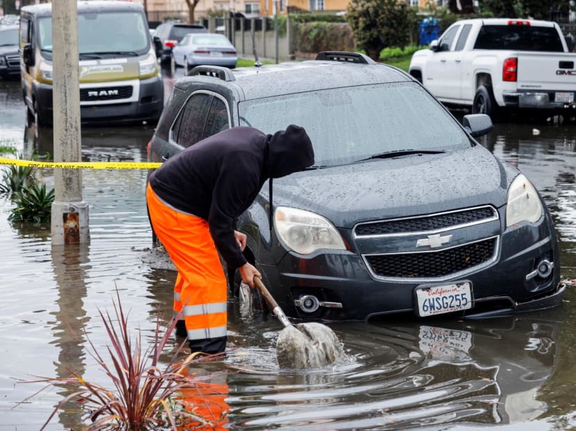 Pacific storm douses California, flooding roads, in first of