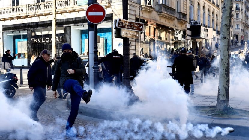 Police fire tear gas as 'Freedom Convoy' protesting against COVID-19 curbs enters Paris