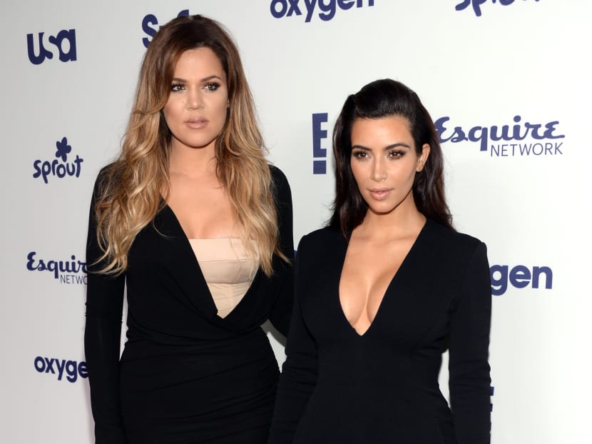 In this May 15, 2014 file photo, Khloe Kardashian, left, and Kim Kardashian arrive at the NBCUniversal Cable Entertainment 2014 Upfront at the Javits Center in New York. Photo: AP