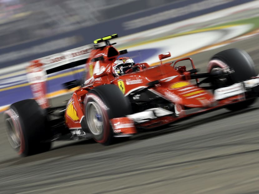 Ferrari Formula One driver Kimi Raikkonen of Finland drives at the Marina Bay street circuit during the second practice session of the Singapore F1 Grand Prix September 18, 2015. Photo: Reuters