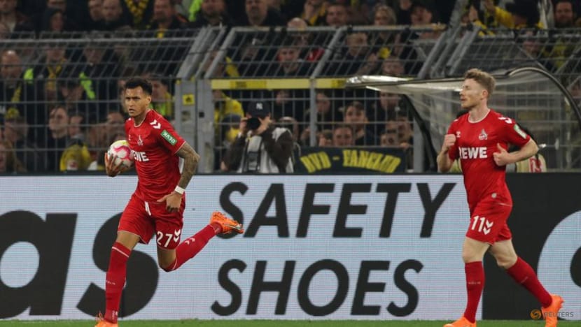 Dazzling Dortmund crush Cologne 6-1 to confirm their title ambitions