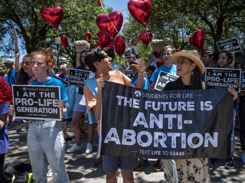 Pro-life protesters stand near the gate of the Texas state capitol at a protest outside the Texas state capitol in May 29, 2021 in Austin, Texas.