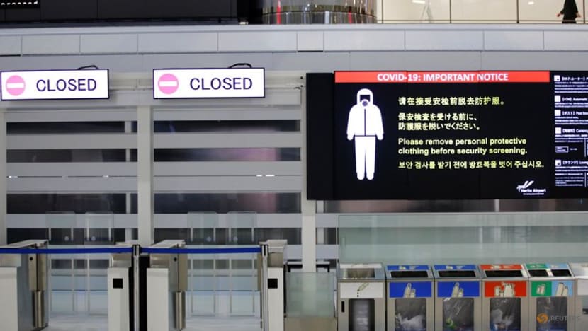 Japan escalates Omicron emergency as airlines halt reservations, second case found