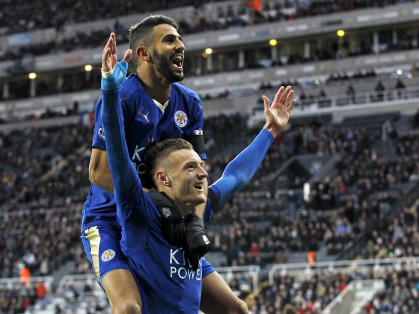 Jamie Vardy celebrating with Riyad Mahrez after scoring a goal for Leicester City. Reuters file photo