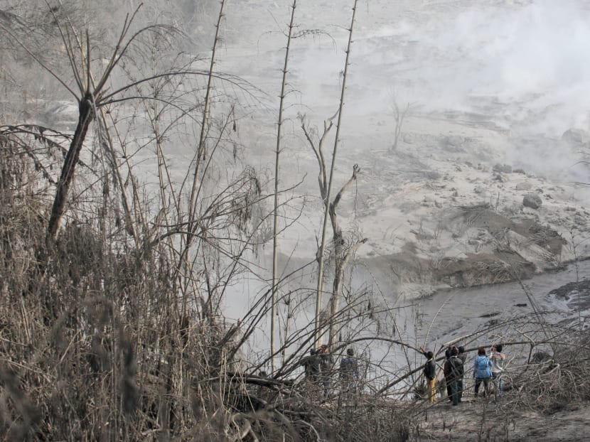 Gallery: Villages in ashes after deadly Indonesia volcano eruption