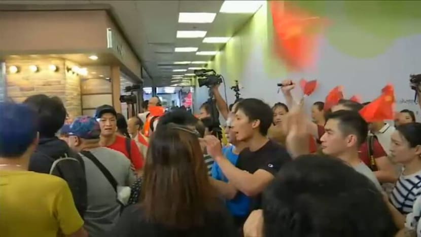 Hong Kong police move in to break up shopping mall protest clashes