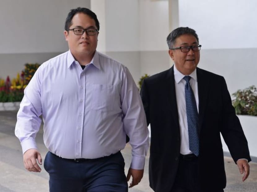Jonathan Tan Huai En (on the left), the elder son of senior lawyer Tan Chee Meng (on the right). His younger brother, Isaac Tan, was jailed by the District Court for a similar offence - defaulting on his National Service. Photo: TODAY file photo