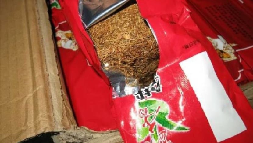 53kg of duty-unpaid tobacco disguised as tea leaves seized; 2 people arrested: Singapore Customs