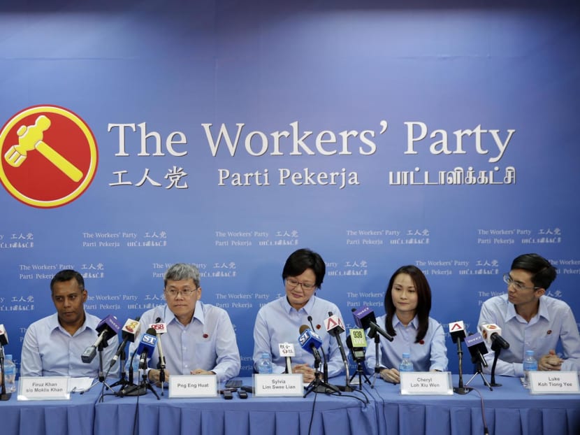 The Workers' Party unveiling its four new candidates for the coming General Election today (Aug 27). (Left to right):  Terence Tan, Firuz Khan, CEC member Png Eng Huat, Chairman Sylvia Lim, Cheryl Loh and Luke Koh during the press conference. Photo: Wee Teck Hian/TODAY