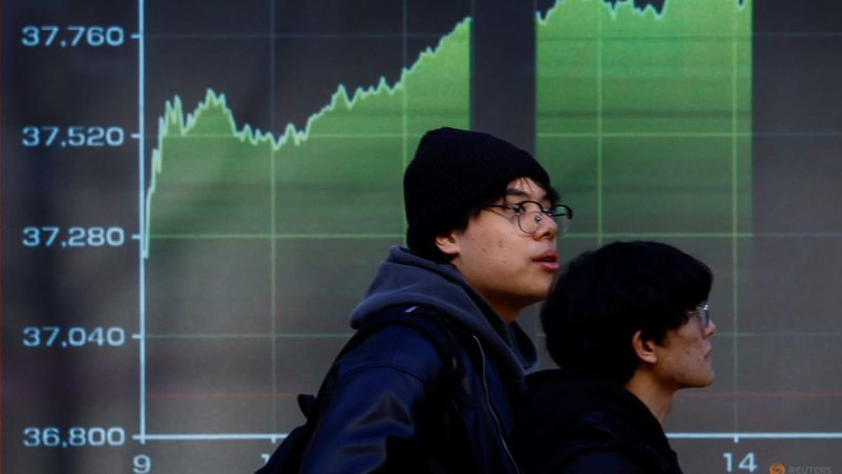 Stocks fall, dollar and yields gain after hot US inflation data - CNA