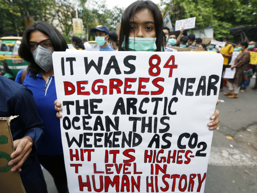Participants holding placards as they take part in a protest march demanding urgent measures to combat climate change, in Kolkata, India, on June 7, 2019. The Washington Post reported on May 14 that the temperature near the entrance to the Arctic Ocean in northwest Russia surged to 84°F (29°C) on May 11.