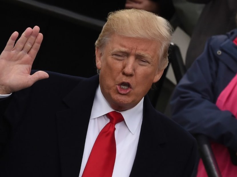 Mr Donald Trump being sworn in as the 45th United States president on Jan 20, 2017. The rise of anti-establishment, protectionist politicians like Mr Trump, amid populist winds on several continents, has sent political parties scurrying to shore up their support, helping China to portray itself as relatively steady. Photo: AFP