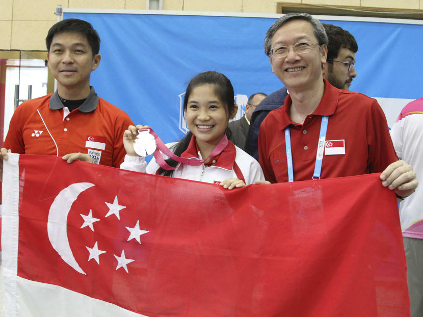 Martina Veloso with Manpower Minister Tan Chuan-Jin (left) and Sam Tan, Minister of State (Culture, Community and Youth) at the Nanjing YOG yesterday. Photo: SNOC