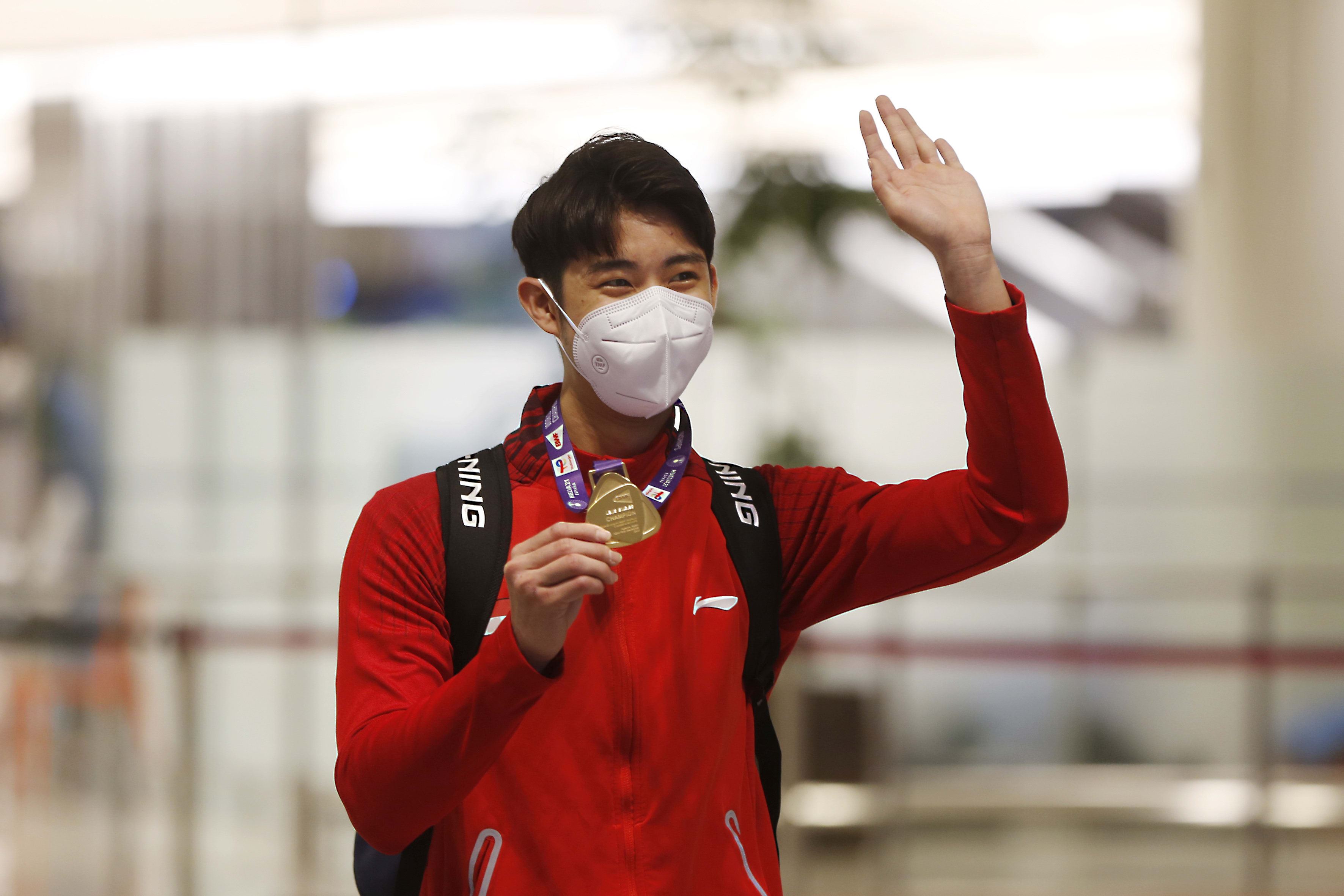 Singapore badminton world champion Loh Kean Yew arriving at Changi Airport on Dec 21, 2021. Singapore badminton world champion Loh Kean Yew arriving at Changi Airport on Dec 21, 2021.