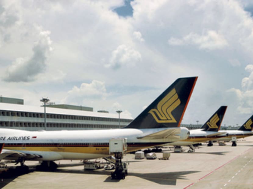 SIA warns of challenging skies, steps up integration with group airlines