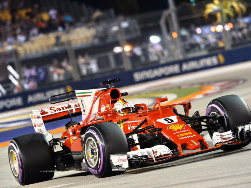 Ferrari's German driver Sebastian Vettel drives during the qualifying session of the Formula One Singapore Grand Prix in Singapore on September 16, 2017. Photo: AFP