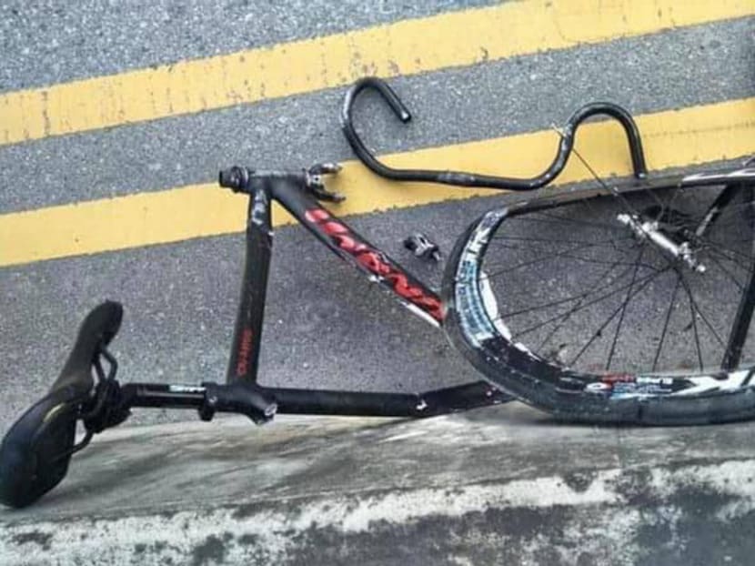 Pictures of the accident posted on the SG Road Vigilante Facebook page showed a black bicycle in the middle of the road with its rear wheel and frame broken off. Pictures of the accident posted on the SG Road Vigilante Facebook page showed a black bicycle in the middle of the road with its rear wheel and frame broken off.