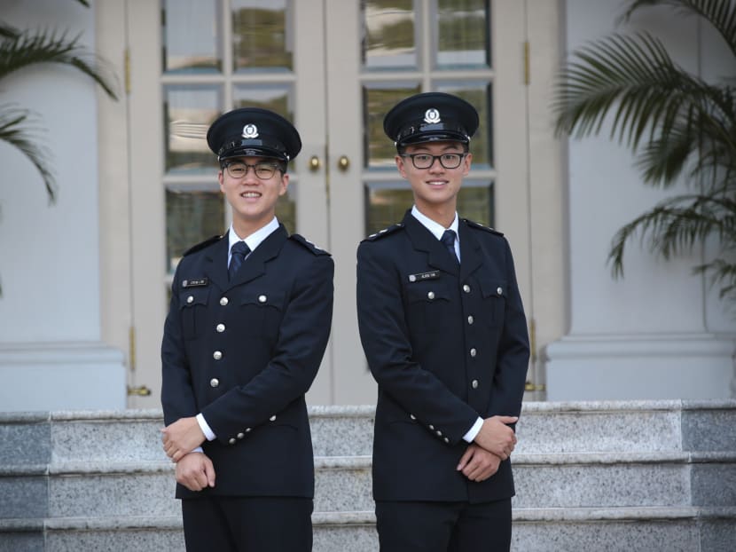 2018 President’s Scholarships Award recipients Stefan Liew (L) and Alden Tan.
