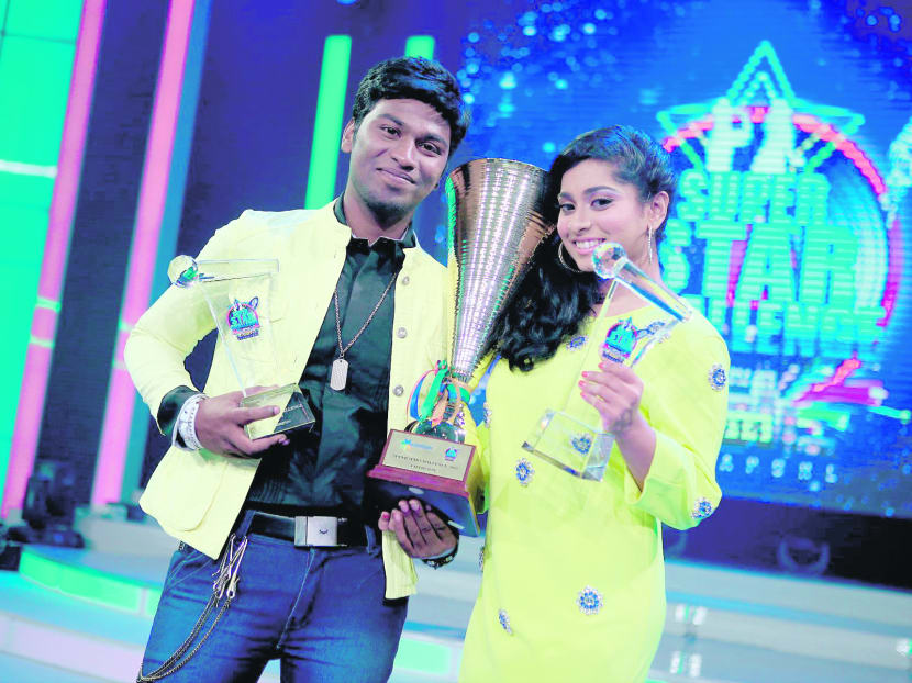 The winners: Aravind and Abhilasha of India.