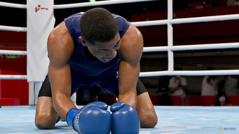 Olympics-Boxing-Sousa's last-gasp knockout earns Brazil gold, historic win for Turkey Olympics-Boxing-Sousa's last-gasp knockout earns Brazil gold, historic win for Turkey