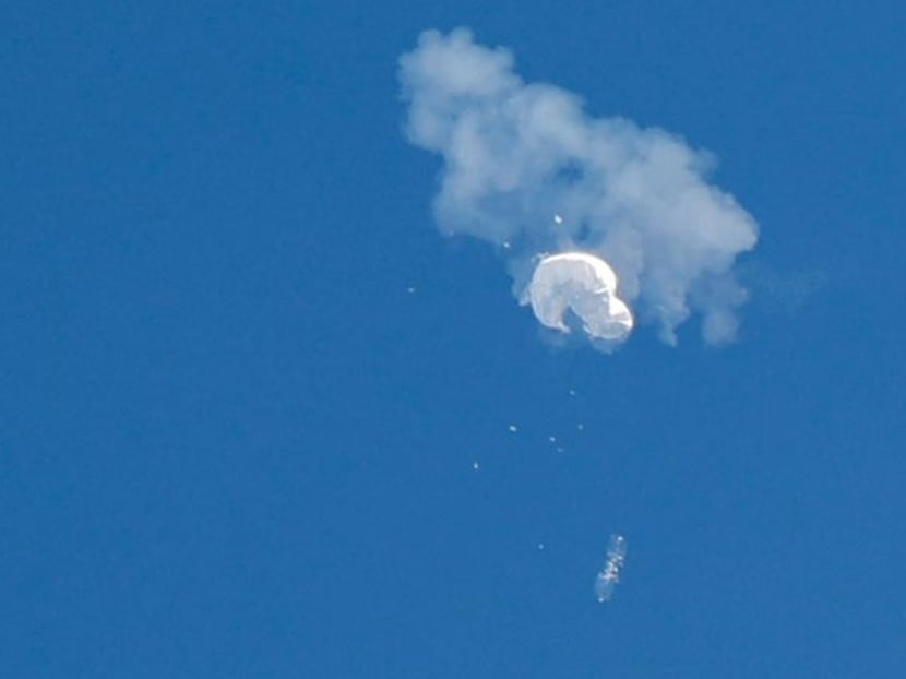 The suspected Chinese spy balloon drifts to the ocean after being shot down off the coast in Surfside Beach, South Carolina, US on Feb 4, 2023.