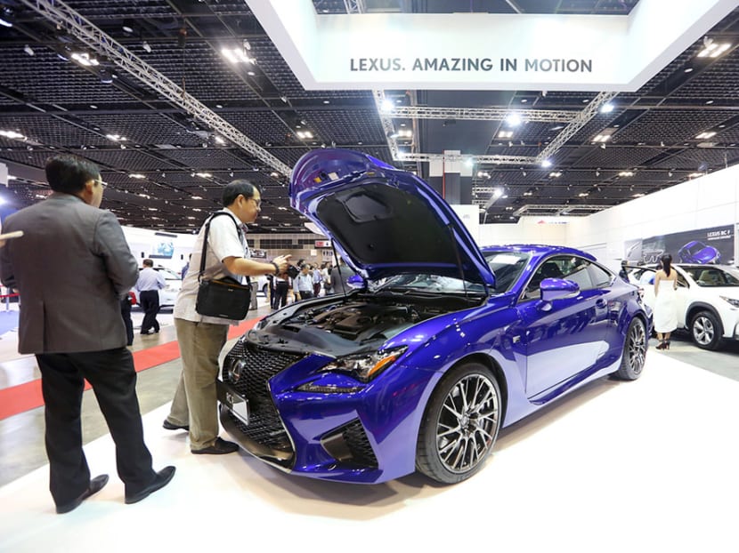 Attendees inspect the Lexus RC F at the Singapore MotorShow, Jan 15, 2015. TODAY file photo