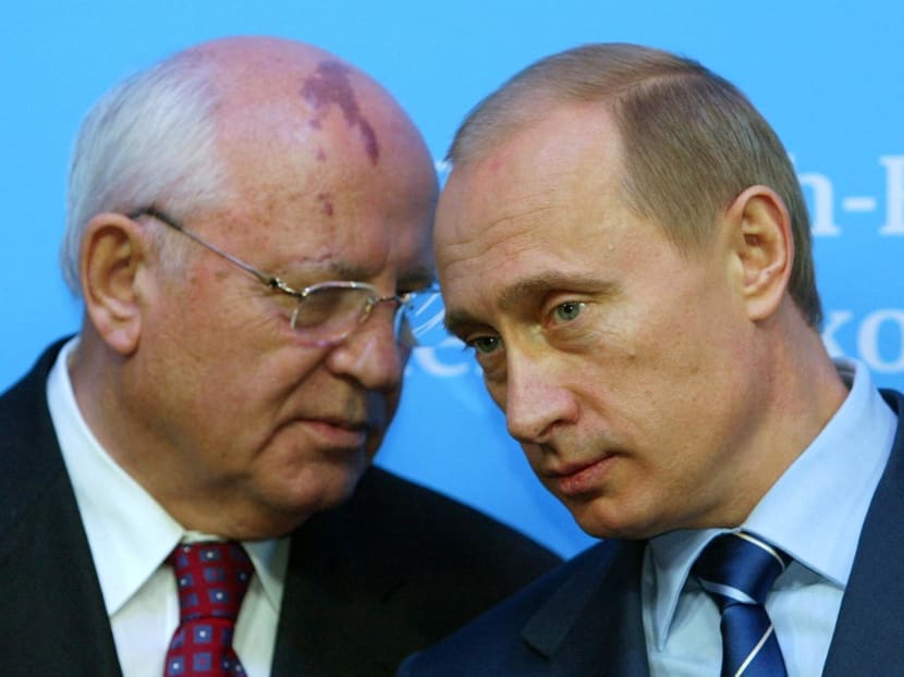 Russian President Vladimir Putin (right) and former President of the Soviet Union Mikhail Gorbachev during a news conference in Germany on Dec 21, 2004.