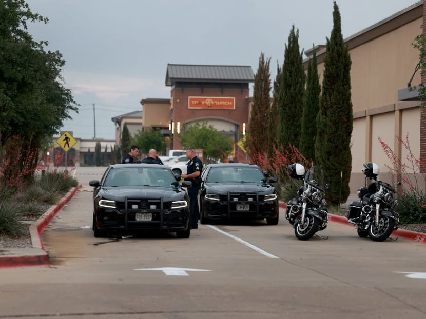 Police block an entrance to the Allen Premium Outlets mall after the mass shooting occurred on May 8, 2023 in Allen, Texas. 