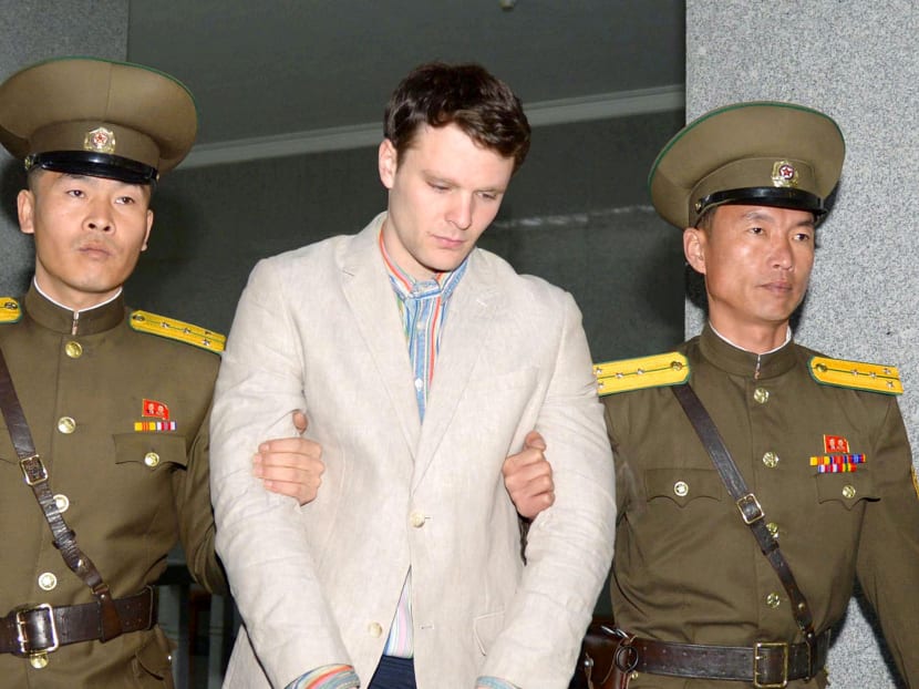 Otto Frederick Warmbier (centre), a University of Virginia student who was detained in North Korea since early January, was taken to North Korea's top court in Pyongyang, North Korea, on March 16, 2016. Photo: Kyodo via Reuters