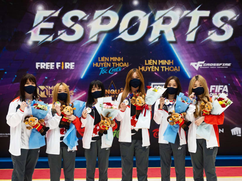 <span><span>Ms Jolene ‘Lustreless’ Poh (left most) and Team TSL clinched the silver medal in the League of Legends: Wild Rift (mobile) event for Singapore at the Hanoi SEA Games on May 18, 2022.&nbsp; </span></span>