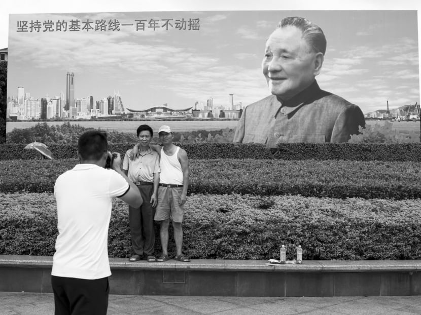 Visitors in front of a picture of late Chinese leader Deng Xiaopin. Deng’s unwritten rules have always carried a fragility in the Chinese Communist Party and look set to 

be discarded as peripheral norms ill-suited in the core leader’s new horizon. Photo: Reuters
