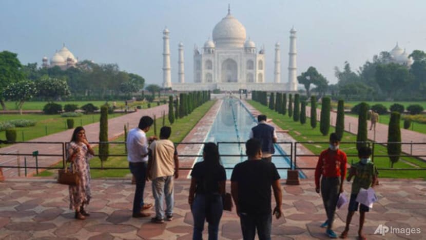 India's famed Taj Mahal reopens for tourists as COVID-19 curbs ease India's famed Taj Mahal reopens for tourists as COVID-19 curbs ease