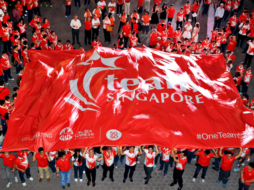 Minister for Social and Family Development and President of the Singapore National Olympic Council Tan Chuan-Jin, and Minister for Culture, Community & Youth Lawrence Wong, at the Team Singapore 28th SEA Games flag presentaion ceremony on May 12, 2015. Photo: Wee Teck Hian