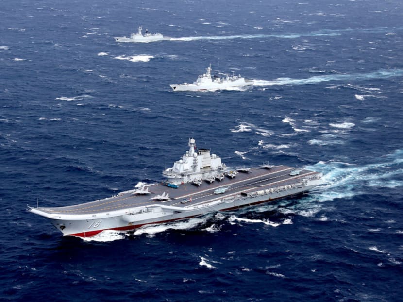 China’s Liaoning aircraft carrier with accompanying fleet conducting a drill in an area of South China Sea in December. PHOTO: REUTERS
