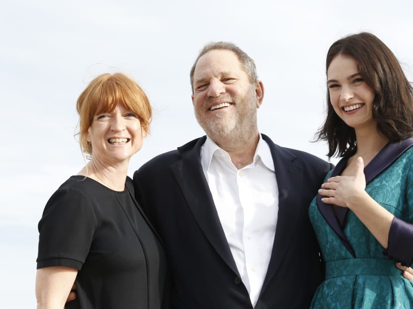 A file photo taken on Oct 5, 2015, shows from left, Executive Producers Faith Penhale and Harvey Weinstein, and British actress Lily James as they pose for the photocall of the TV series "War and Peace" during the MIPCOM audiovisual trade fair in Cannes, southeastern France. Photo: AFP