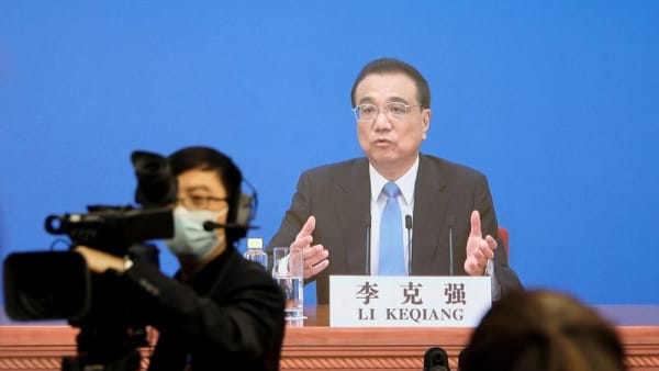 China premier issues warning on pandemic-hit economy