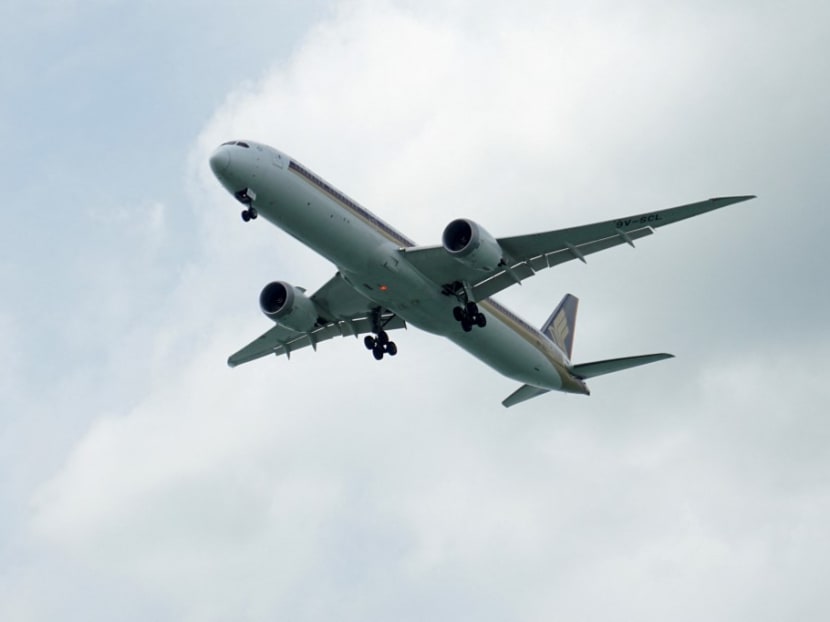 In this photo taken on Oct 9, 2021, a Singapore Airlines (SIA) passenger plane prepares for landing at Changi Airport in Singapore.
In this photo taken on Oct 9, 2021, a Singapore Airlines (SIA) passenger plane prepares for landing at Changi Airport in Singapore.