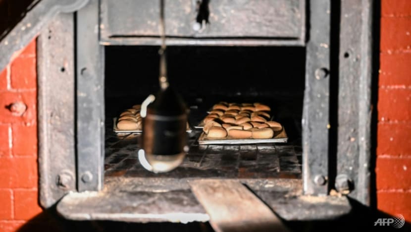 Philippine bakeries shrink 'poor man's bread' as inflation bites Philippine bakeries shrink 'poor man's bread' as inflation bites