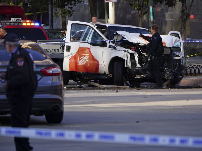 Police investigates the truck allegedly used by Sayfullo Saipo, who killed eight people and wounded dozens when he drove the vehicle down a popular bike path in Lower Manhattan, New York. The Islamic State (IS) on late Thursday (Nov 2) claimed responsibility for the attack. Photo: New York Times