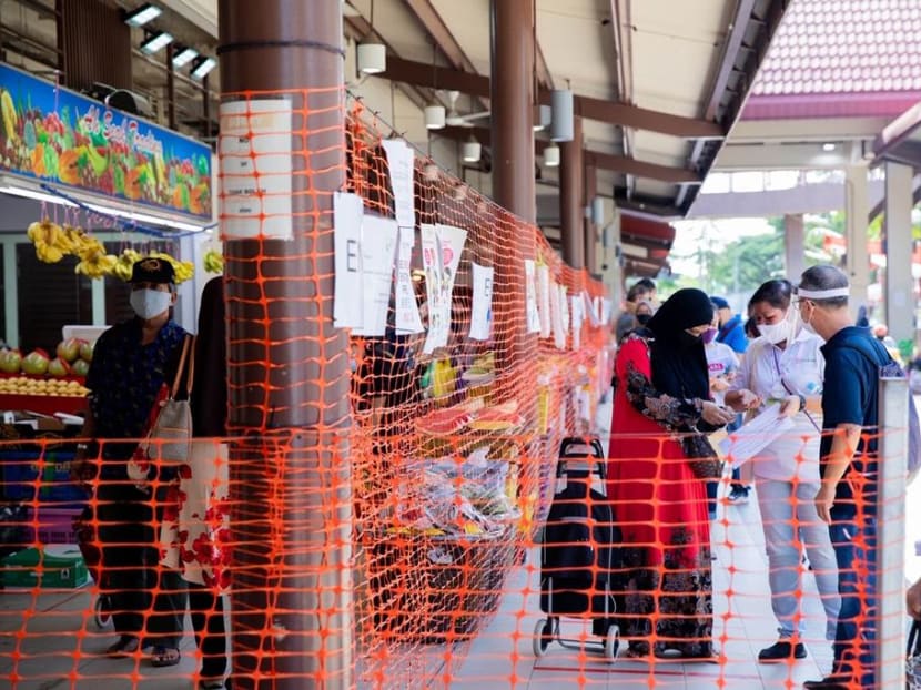 The Geylang Serai Market pictured in April amid the circuit breaker measures. Eligible stallholders who make the switch to e-payments stand to receive S$1,500 over five months under an incentive scheme.