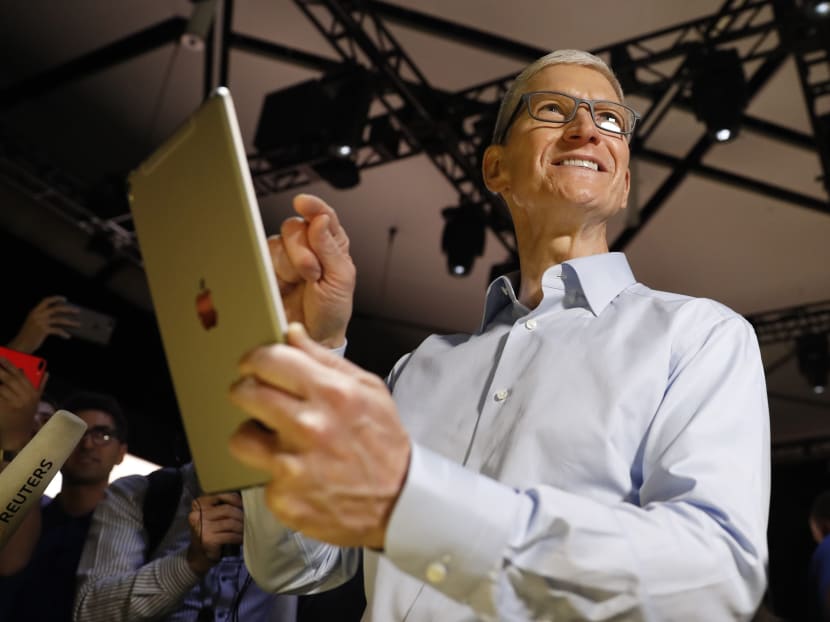 Tim Cook, Apple CEO, holds an iPad Pro after his keynote address to Apple's annual world wide developer conference (WWDC) in San Jose, California. Photo: Reuters