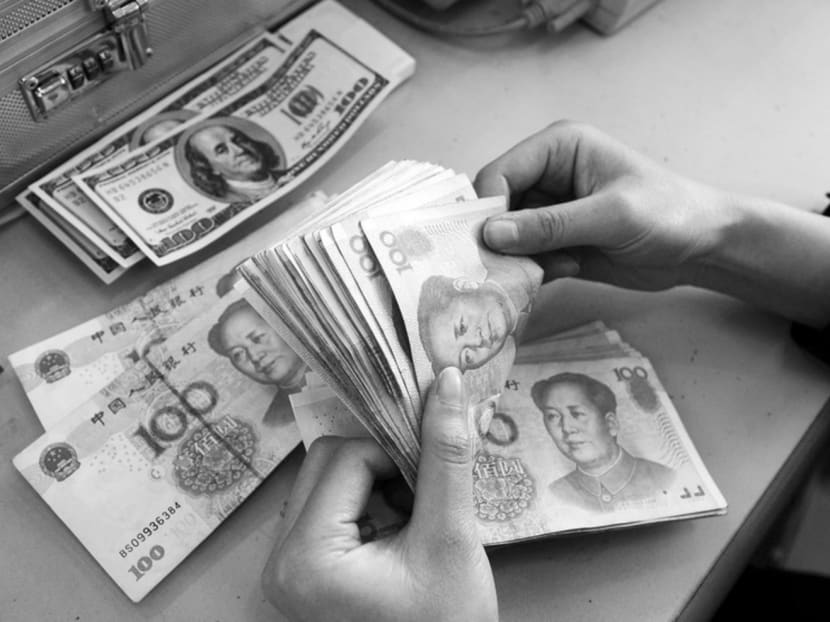 At US$3.3 trillion (S$4.7 trillion) in December 2015, China’s foreign-exchange reserves are still enough to cover more than four times its short-term external debt. Photo: Reuters